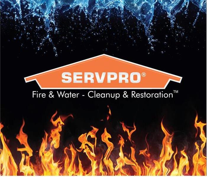 A photo of the SERVPRO orange house Logo with fire and water