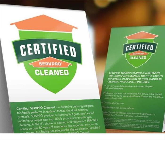 Certified: SERVPRO Cleaned table tents on top of a table