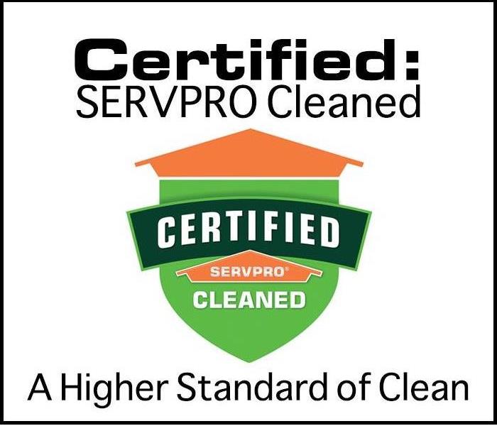 Green SERVPRO sign that reads "Certified: SERVPRO Cleaned"